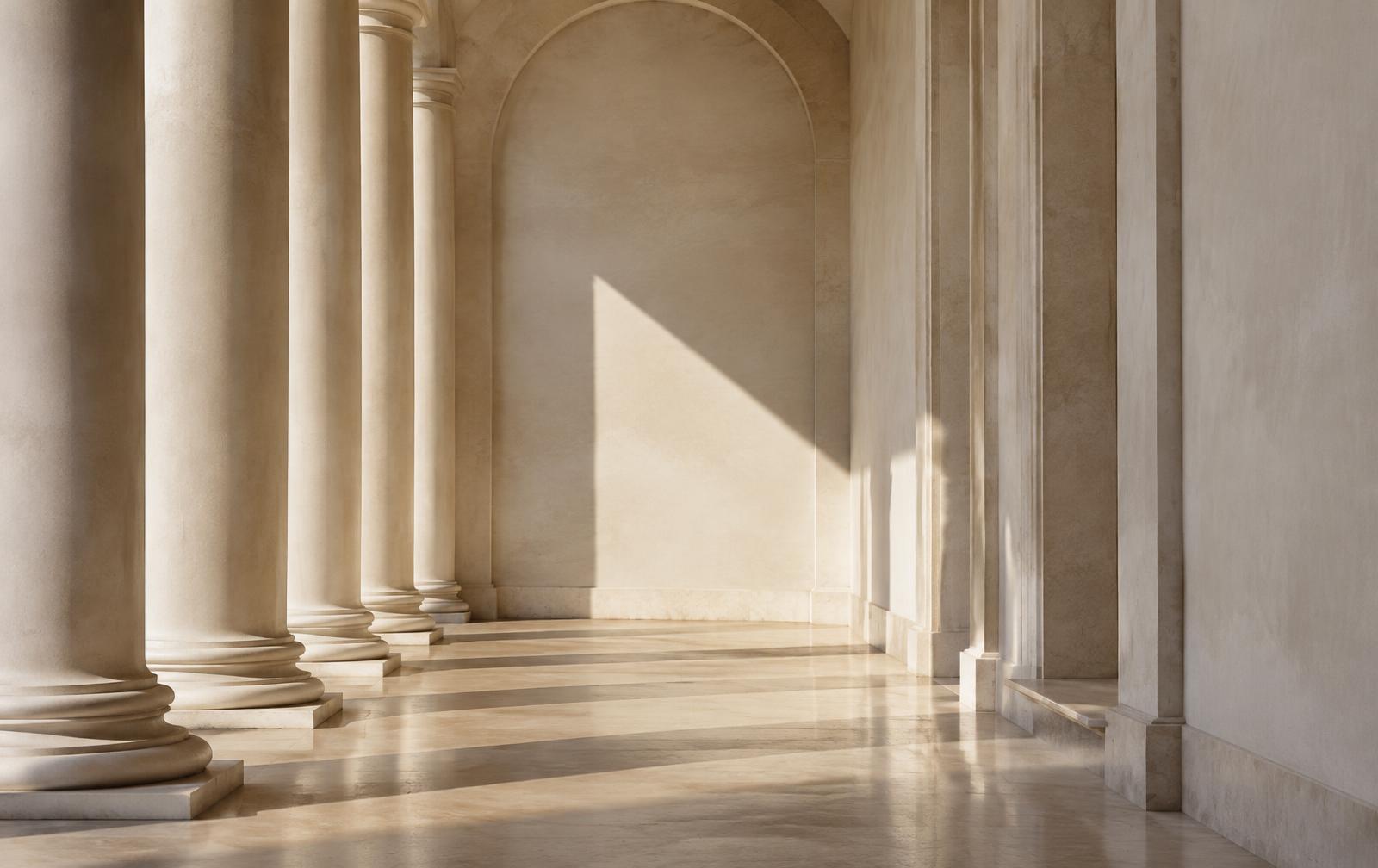 Warm stone colonnade with long natural shadows
